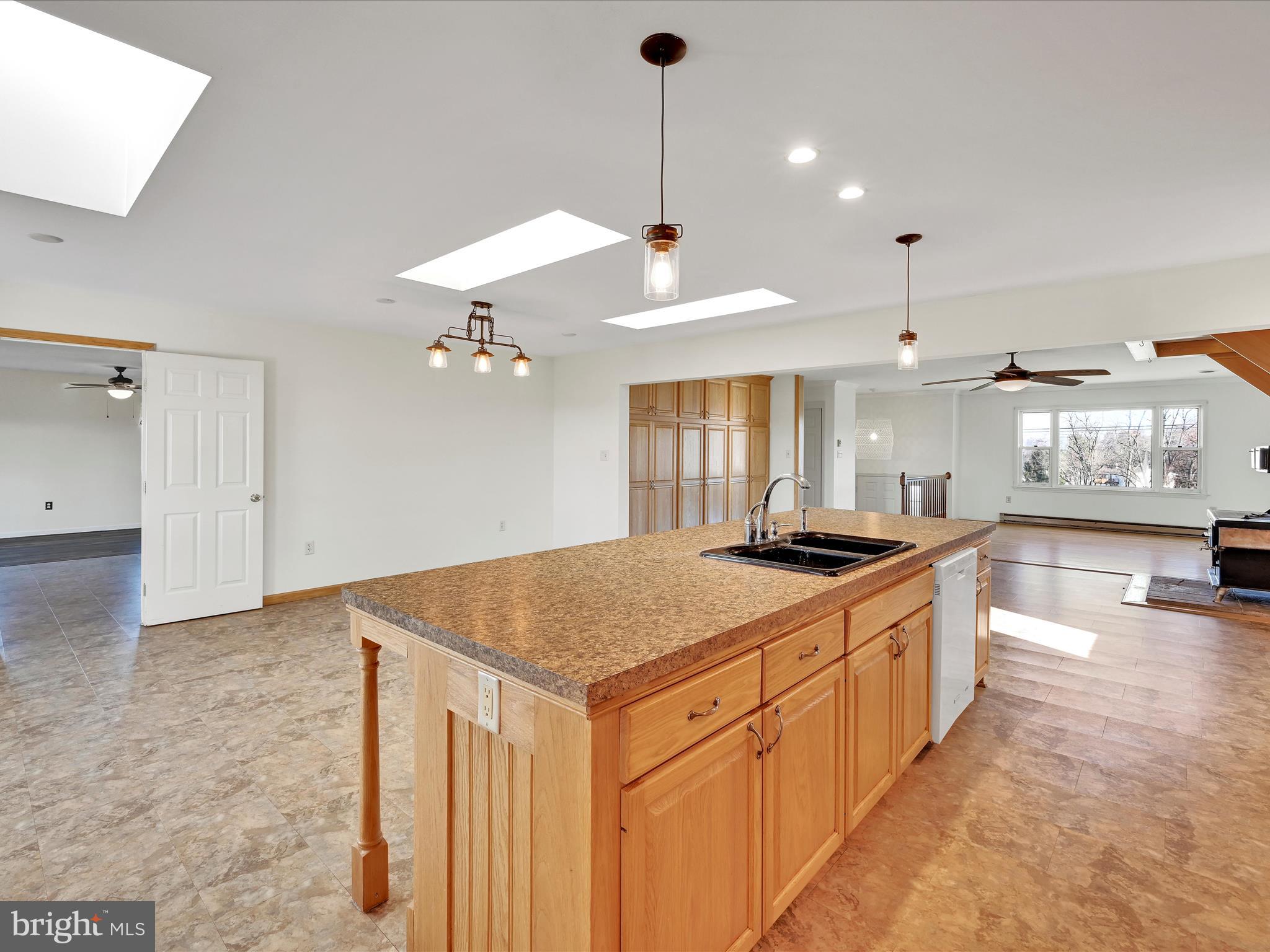 20 Bomberger Road Lititz, PA 17543 - Photo 16 of 50 a kitchen with stainless steel appliances granite countertop a sink a stove and a refrigerator
