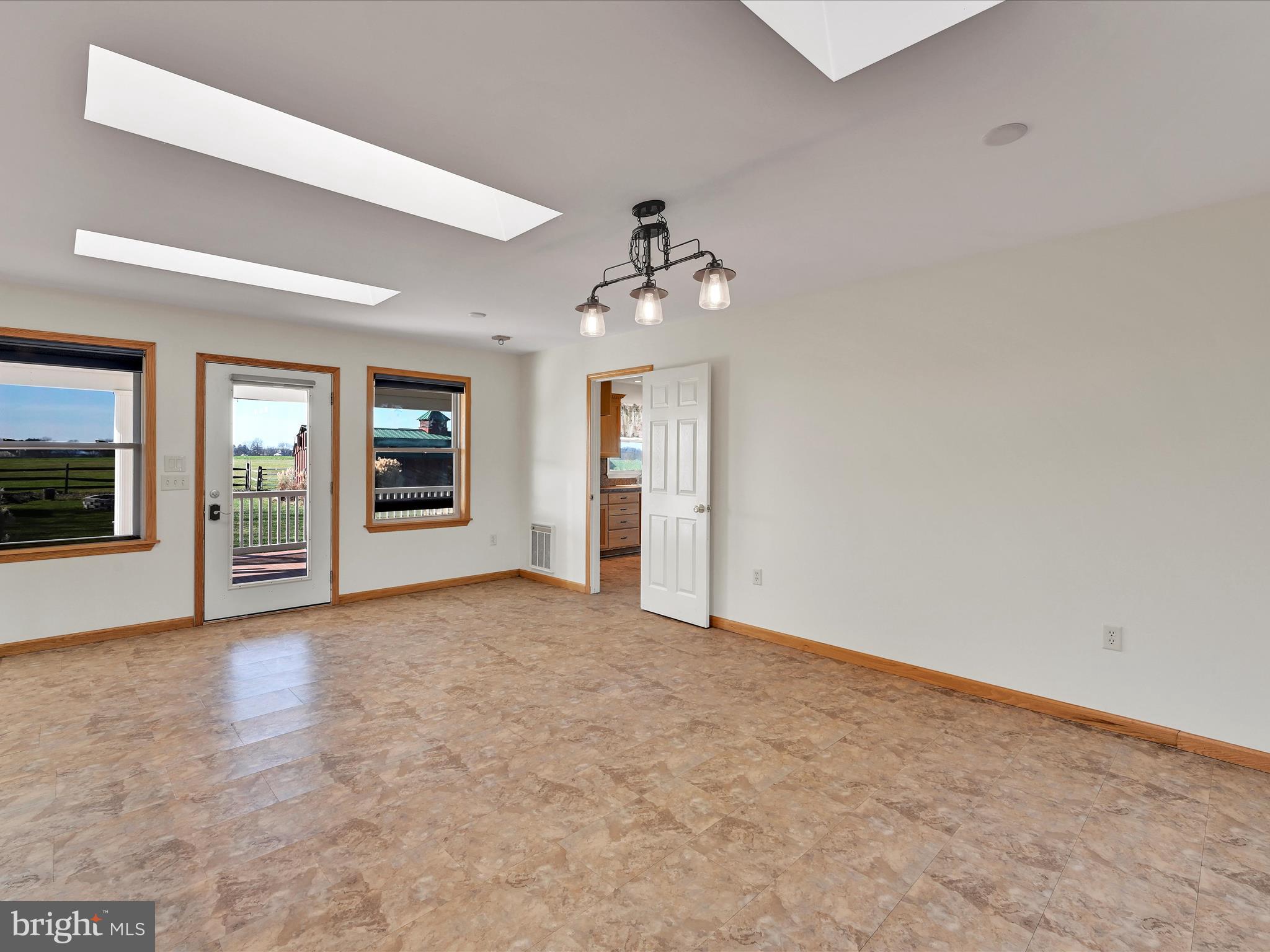 20 Bomberger Road Lititz, PA 17543 - Photo 17 of 50 an empty room with windows and fireplace