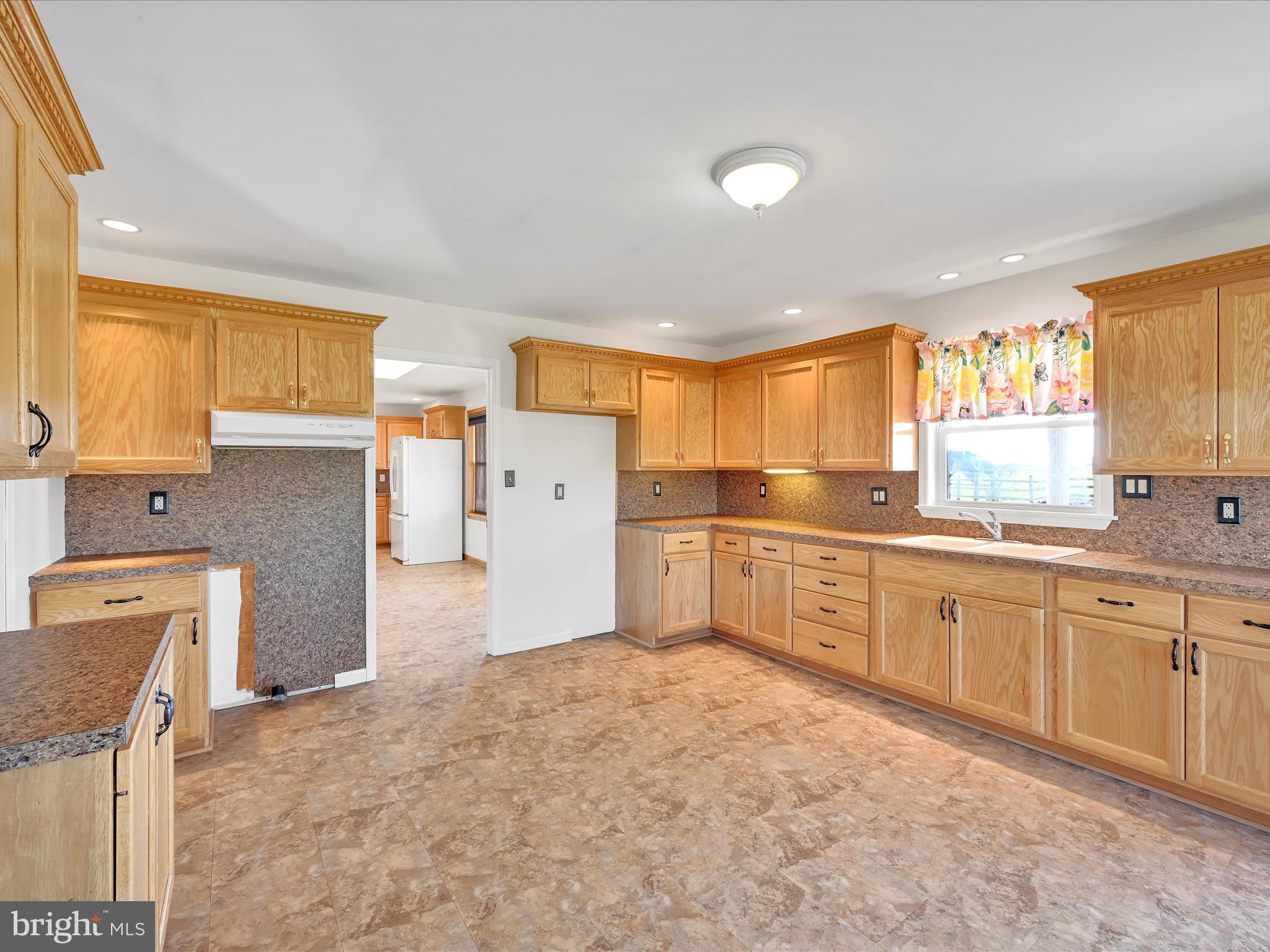 20 Bomberger Road Lititz, PA 17543 - Photo 20 of 50 a large kitchen with stainless steel appliances granite countertop a sink and cabinets