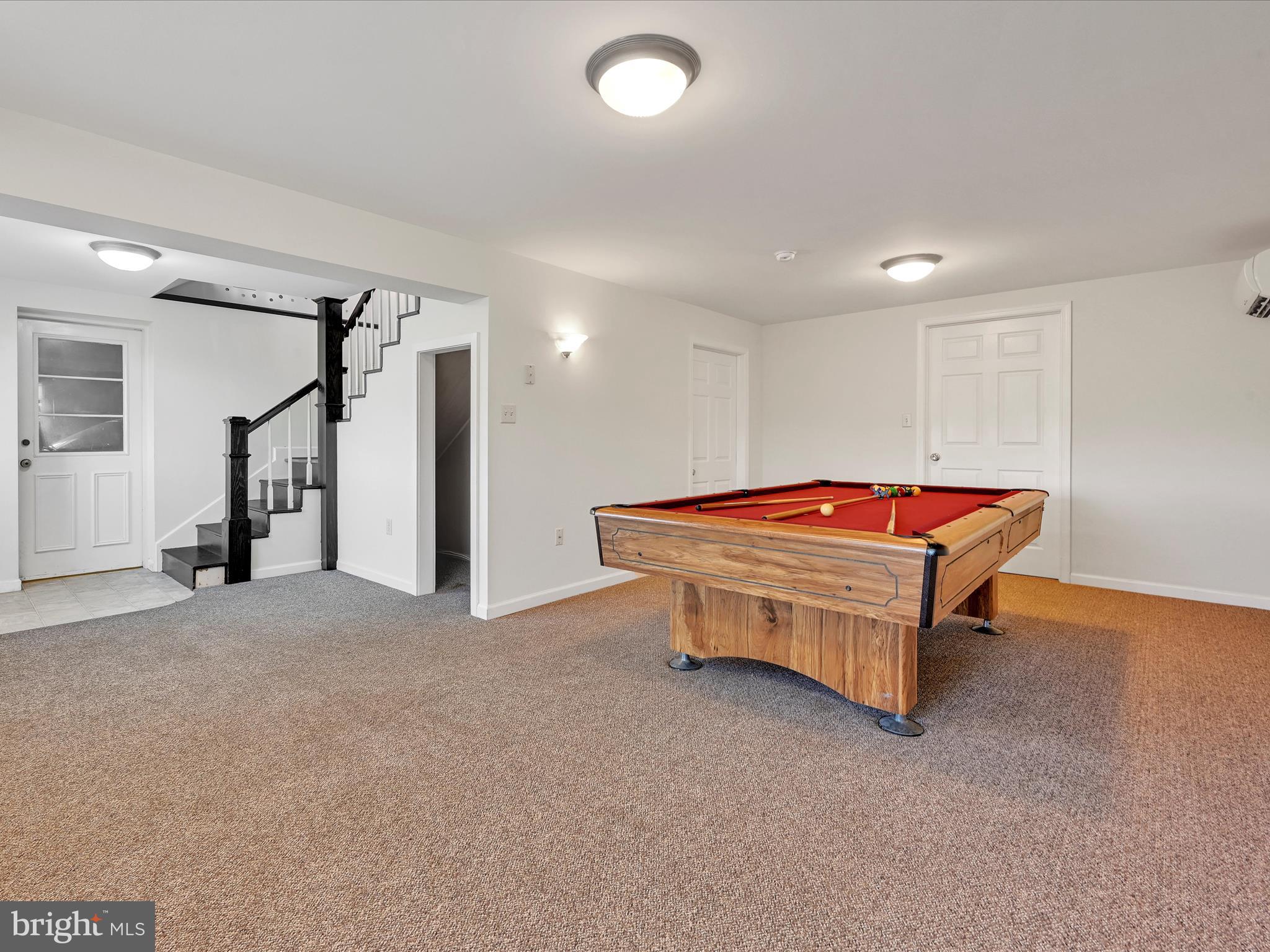 20 Bomberger Road Lititz, PA 17543 - Photo 35 of 50 a room with pool table and a wooden floor