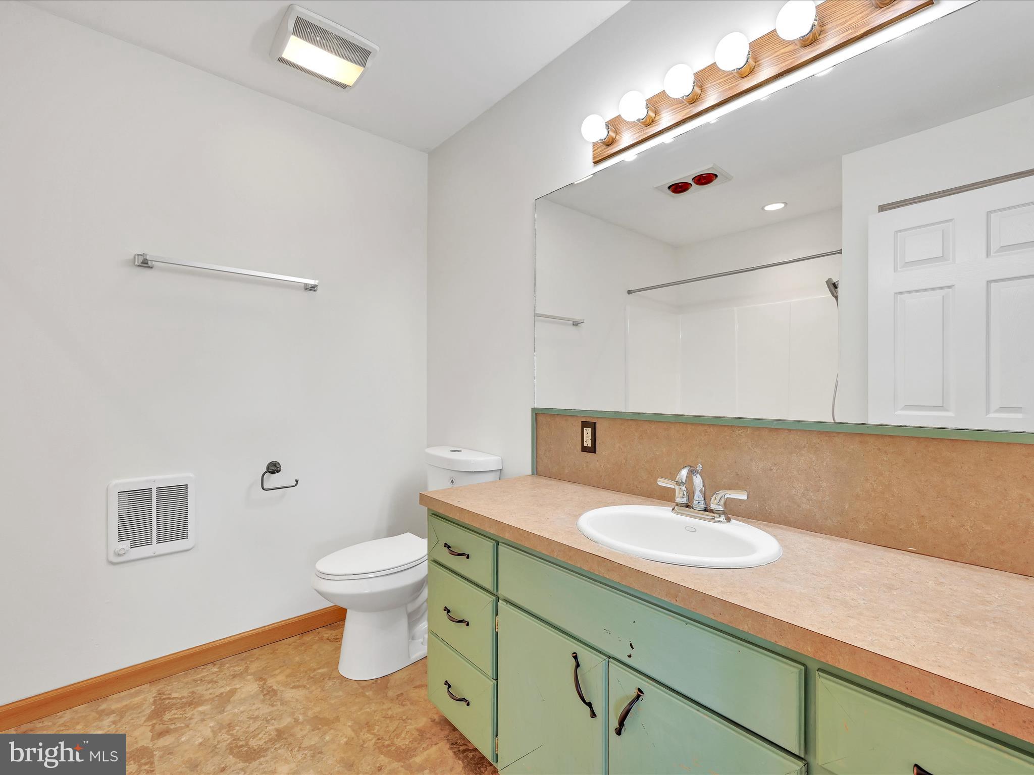 20 Bomberger Road Lititz, PA 17543 - Photo 37 of 50 a bathroom with a sink toilet and a mirror