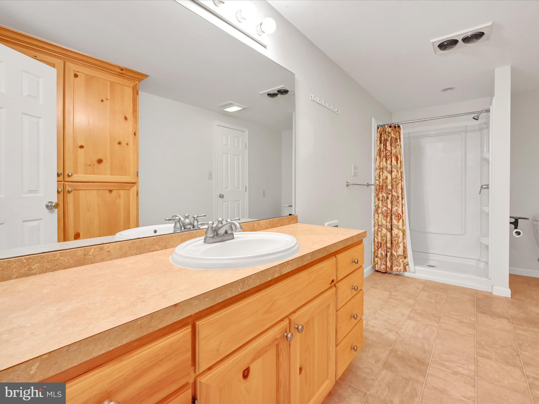 20 Bomberger Road Lititz, PA 17543 - Photo 41 of 50 a bathroom with a sink and a mirror
