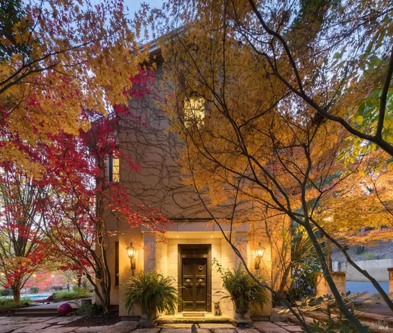 an aerial view of a house with a garden