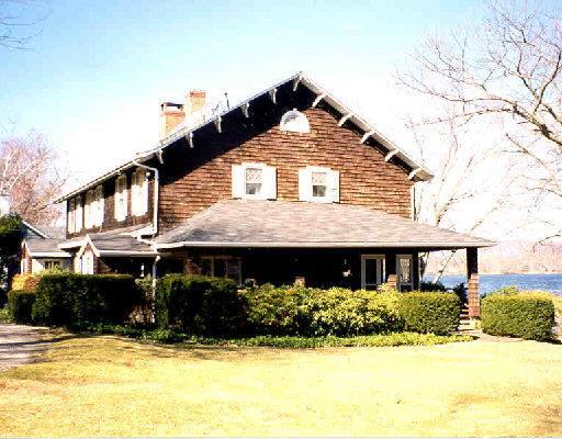 210 West Shore Road Washington, CT 06777 - Photo 1 of 1 a front view of a house with a yard
