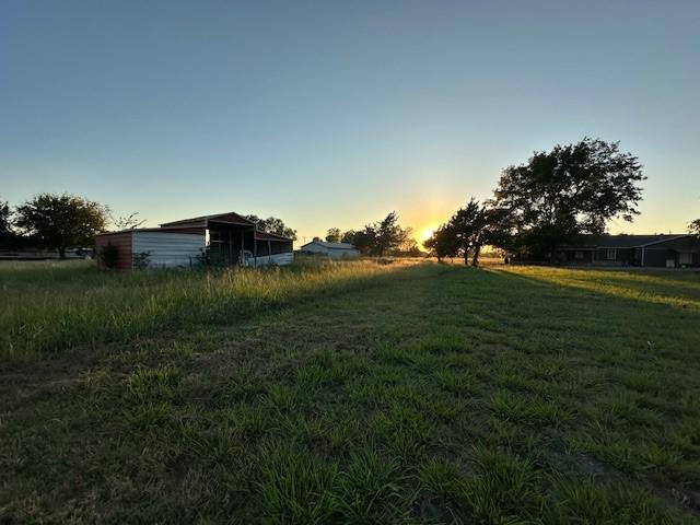 Tba Live Oak Road Princeton, TX 75407 - Photo 9 of 15 a view of a green field with wooden fence