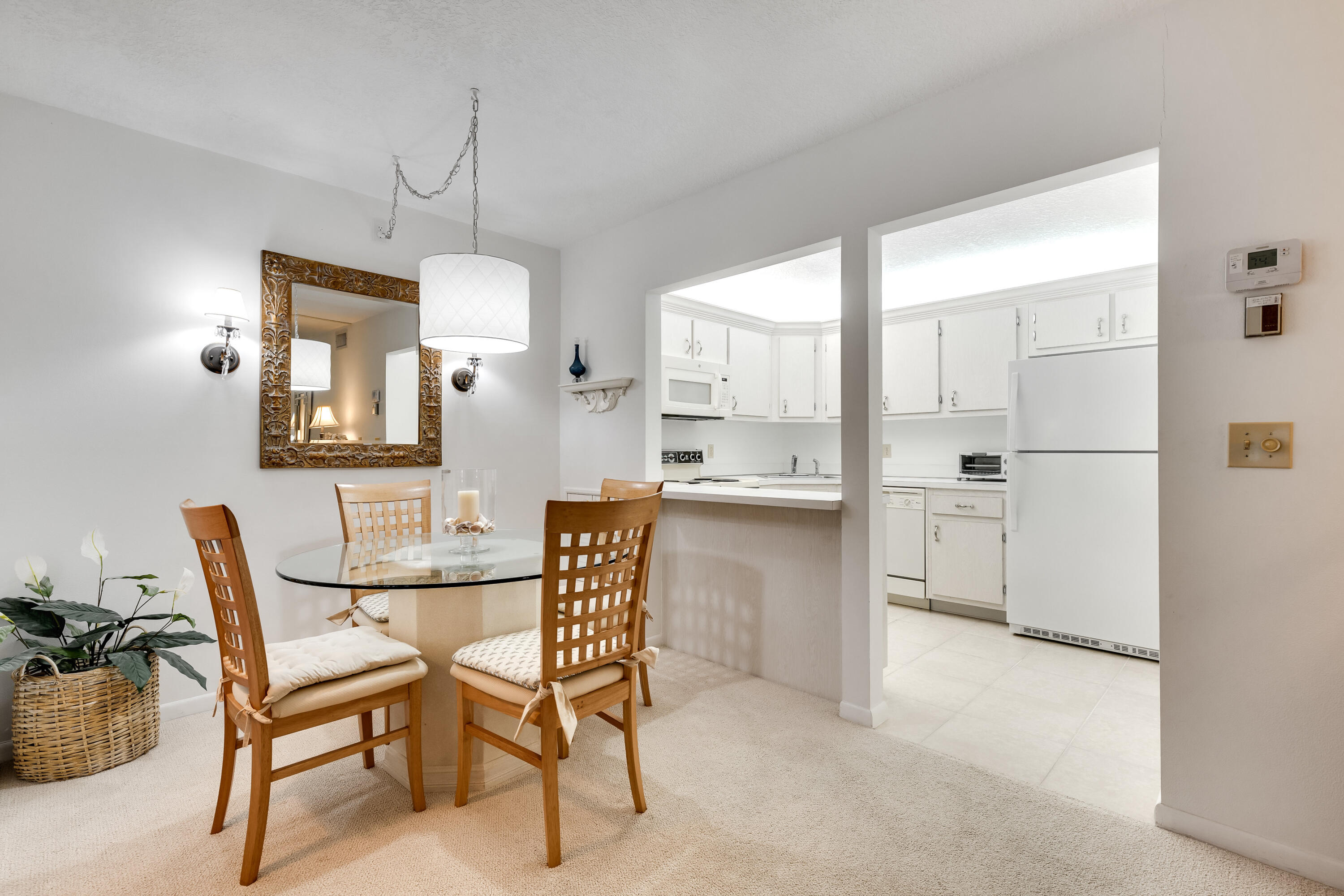 122 Lake Pine Circle, Unit B1 Greenacres, FL 33463 - Photo 11 of 36 a view of kitchen with furniture and window