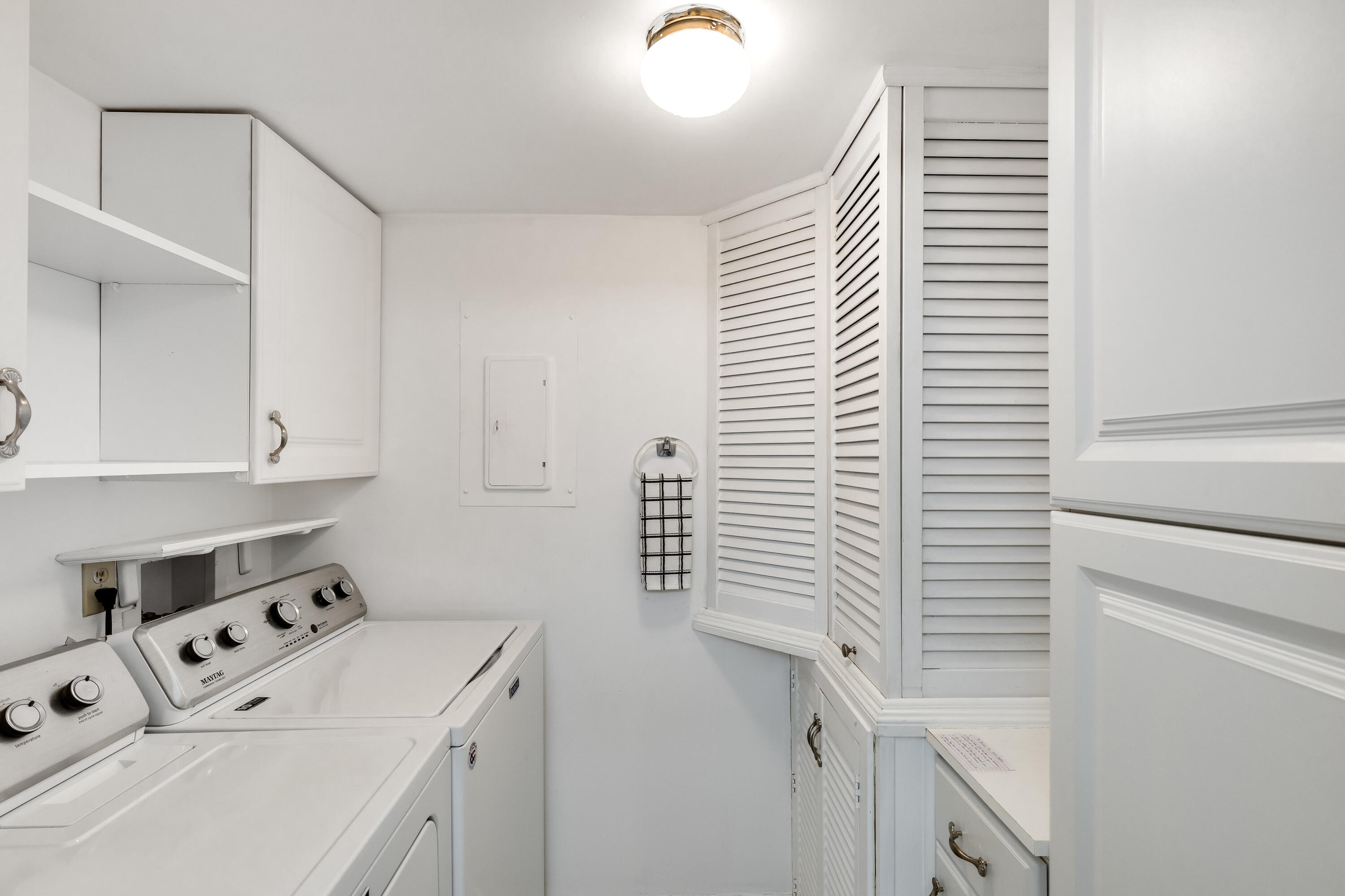 122 Lake Pine Circle, Unit B1 Greenacres, FL 33463 - Photo 18 of 36 a room with storage and utility