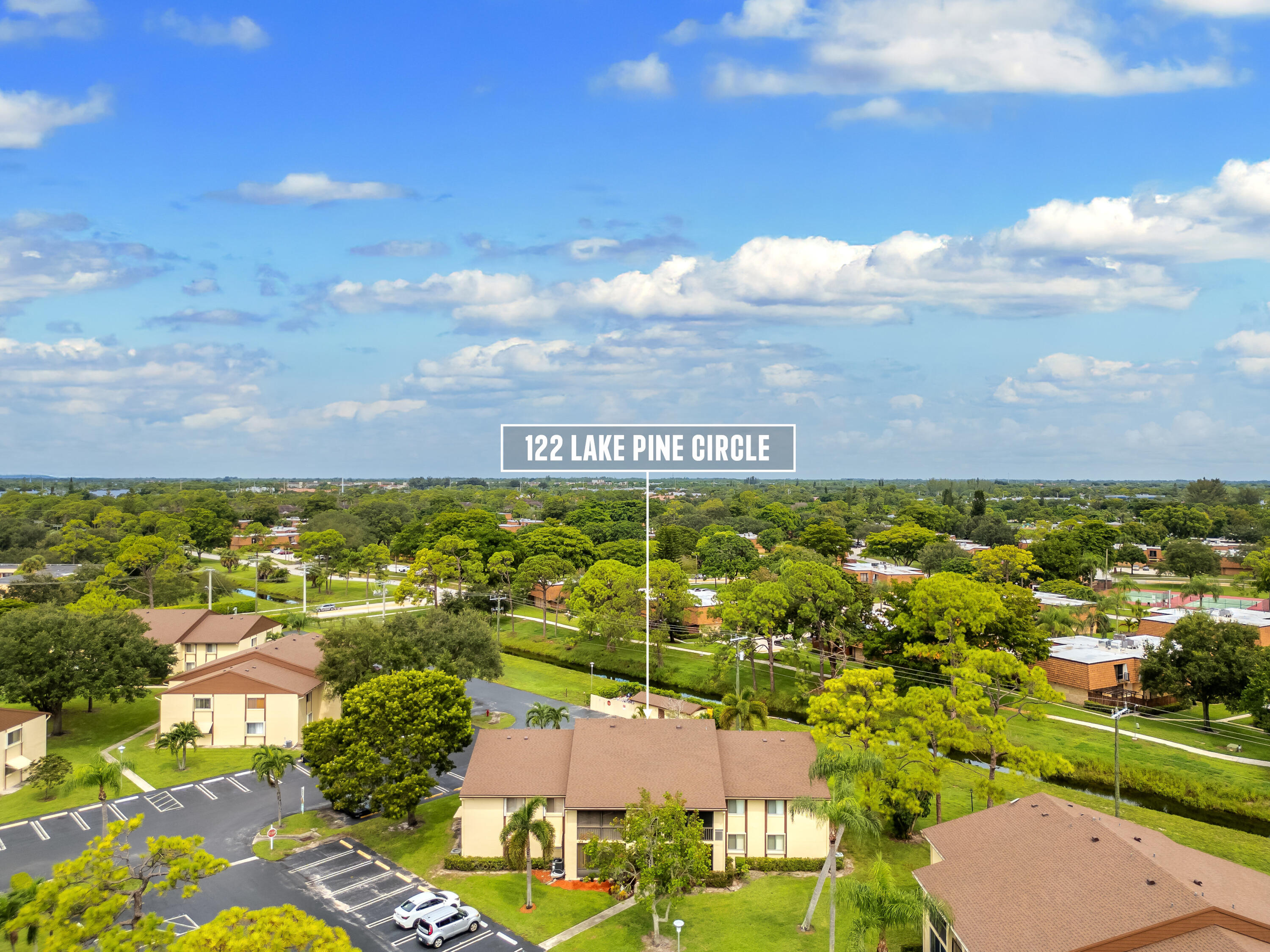 122 Lake Pine Circle, Unit B1 Greenacres, FL 33463 - Photo 35 of 36 a view of a city