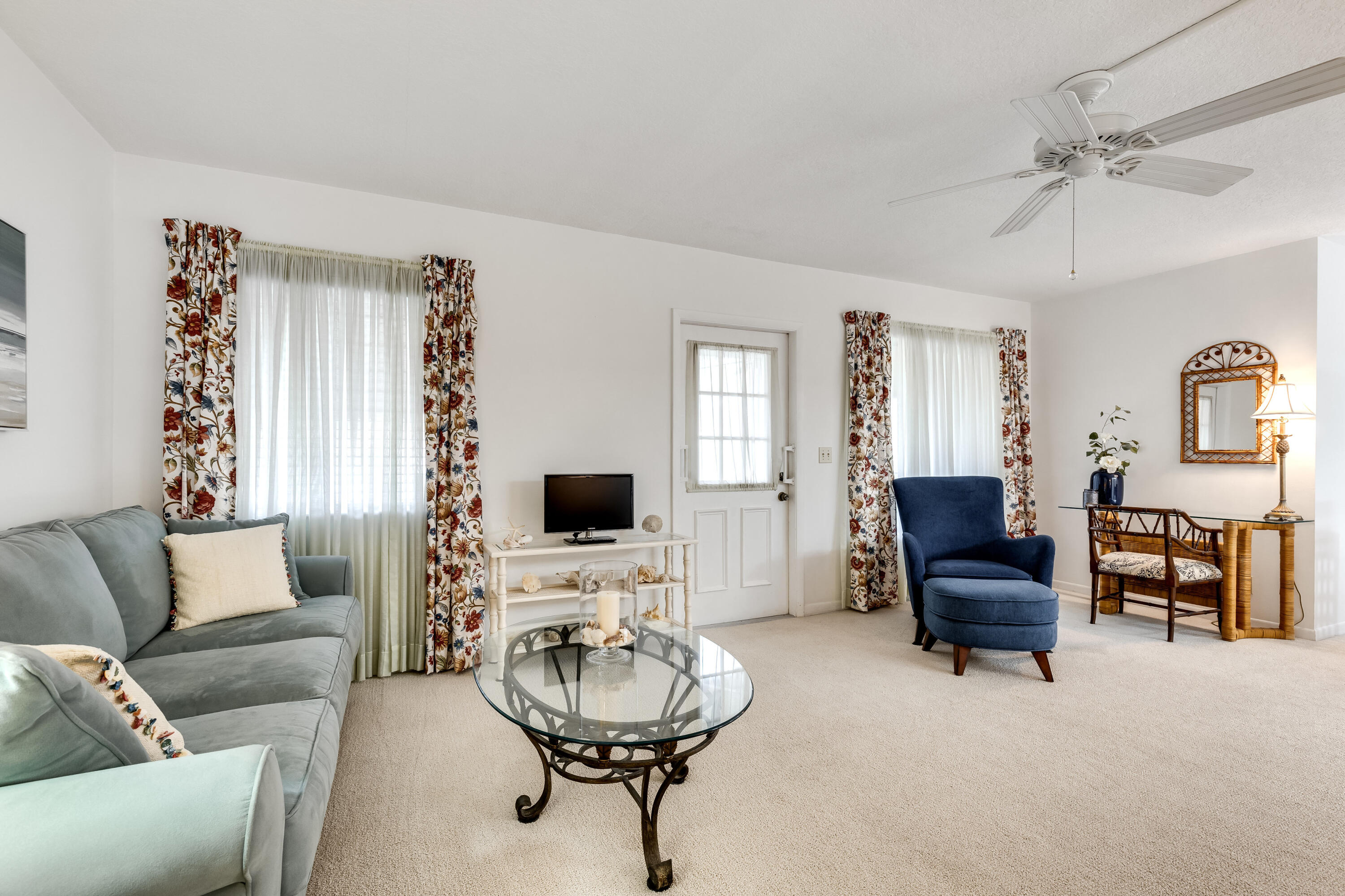122 Lake Pine Circle, Unit B1 Greenacres, FL 33463 - Photo 8 of 36 a living room with furniture and a flat screen tv
