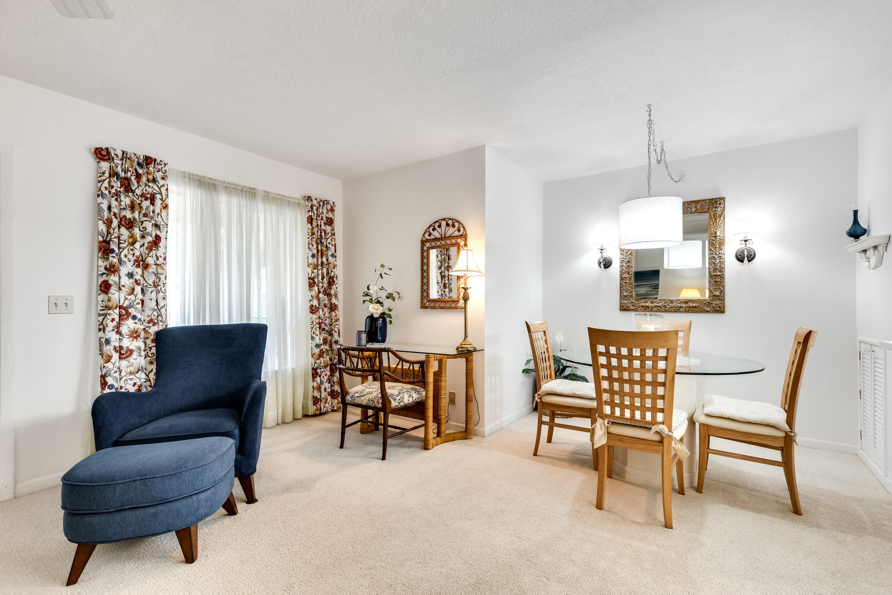 122 Lake Pine Circle, Unit B1 Greenacres, FL 33463 - Photo 9 of 36 a living room with furniture and a window