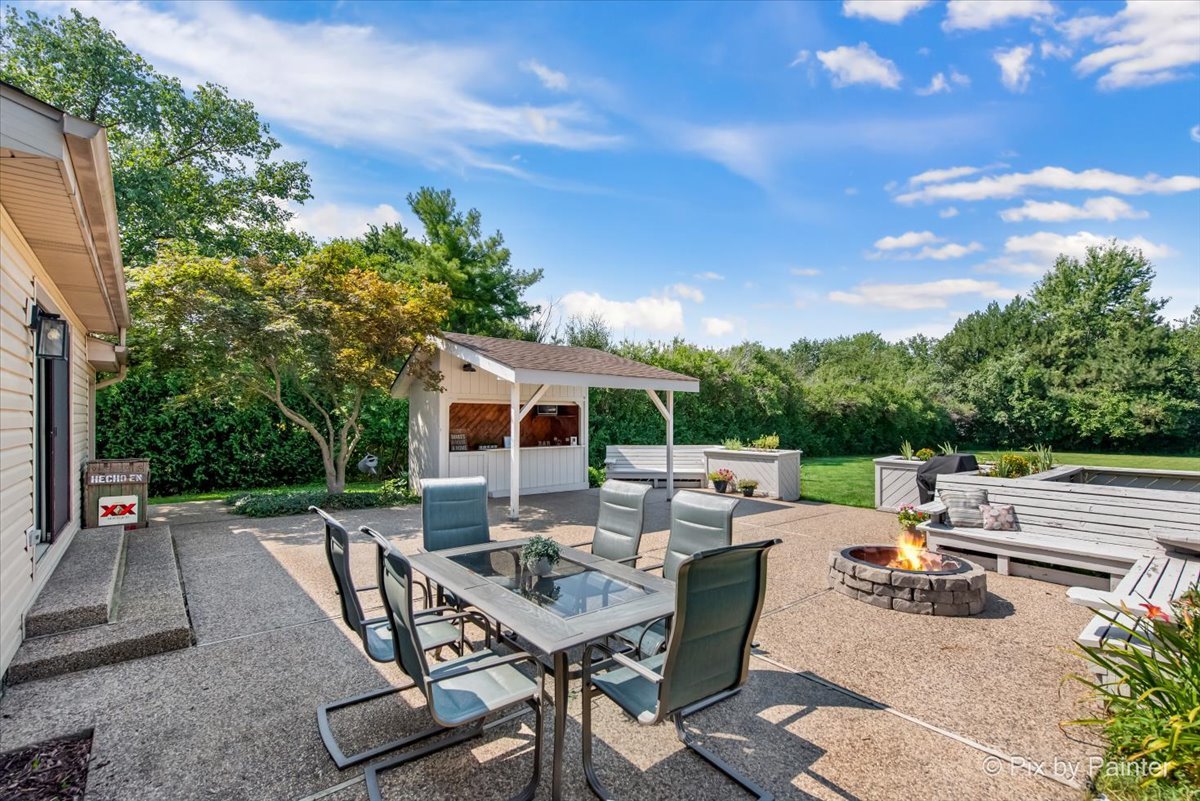 906 Edward Street Wheeling, IL 60090 - Photo 30 of 34 a view of backyard with seating area and green space