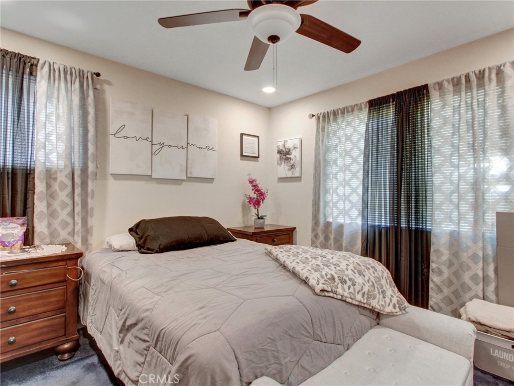 10922 Vickers Drive Garden Grove, CA 92840 - Photo 13 of 25 a bedroom with a bed closet and window