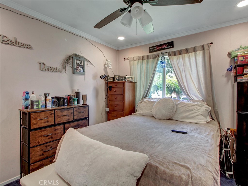 10922 Vickers Drive Garden Grove, CA 92840 - Photo 18 of 25 a bedroom with a bed and a window