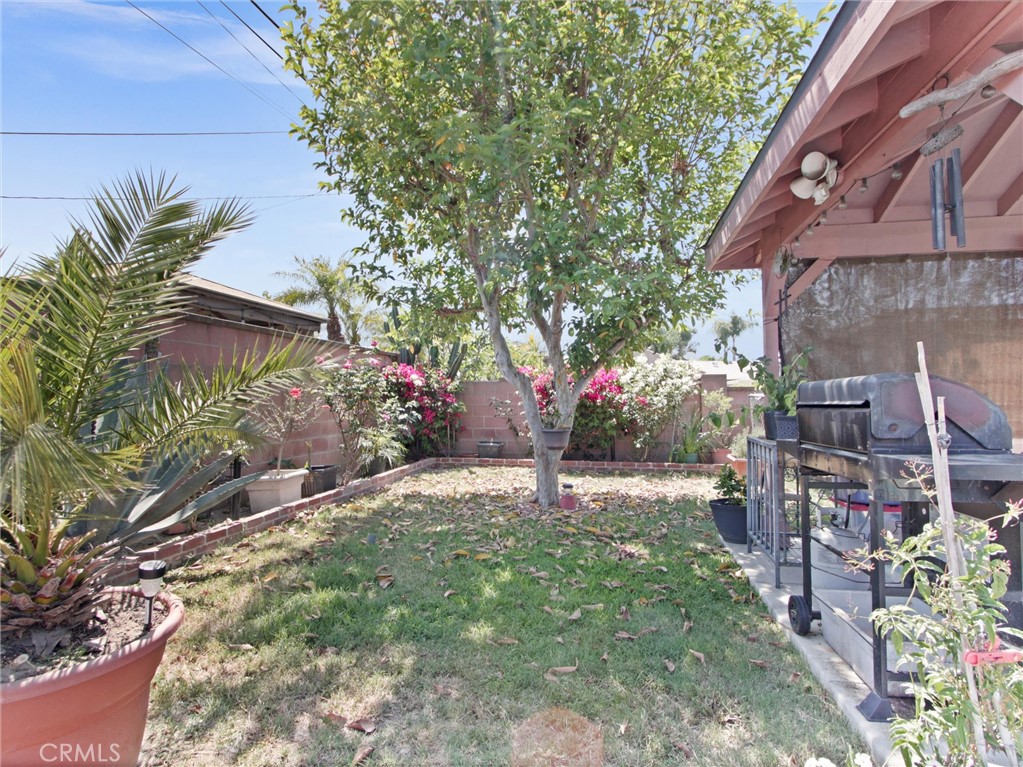 10922 Vickers Drive Garden Grove, CA 92840 - Photo 24 of 25 a view of a backyard with a tree