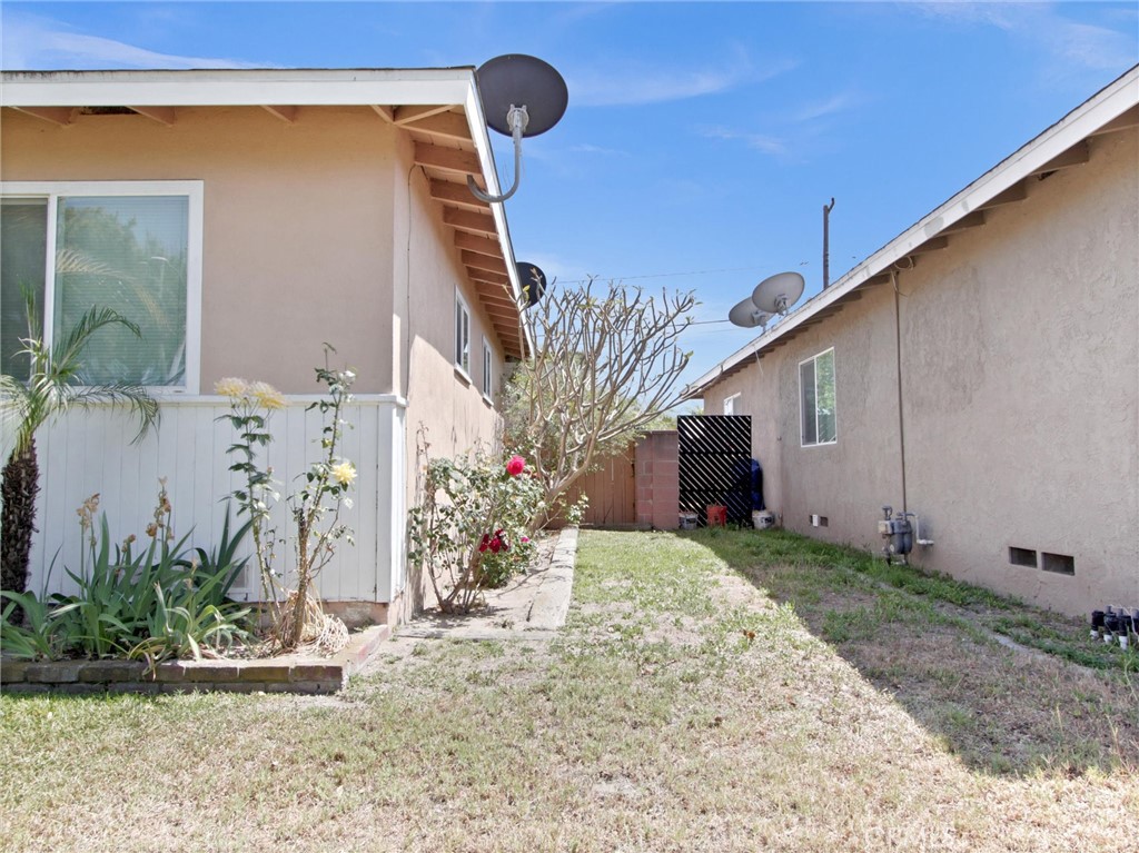 10922 Vickers Drive Garden Grove, CA 92840 - Photo 25 of 25 a backyard of a house with flower plants