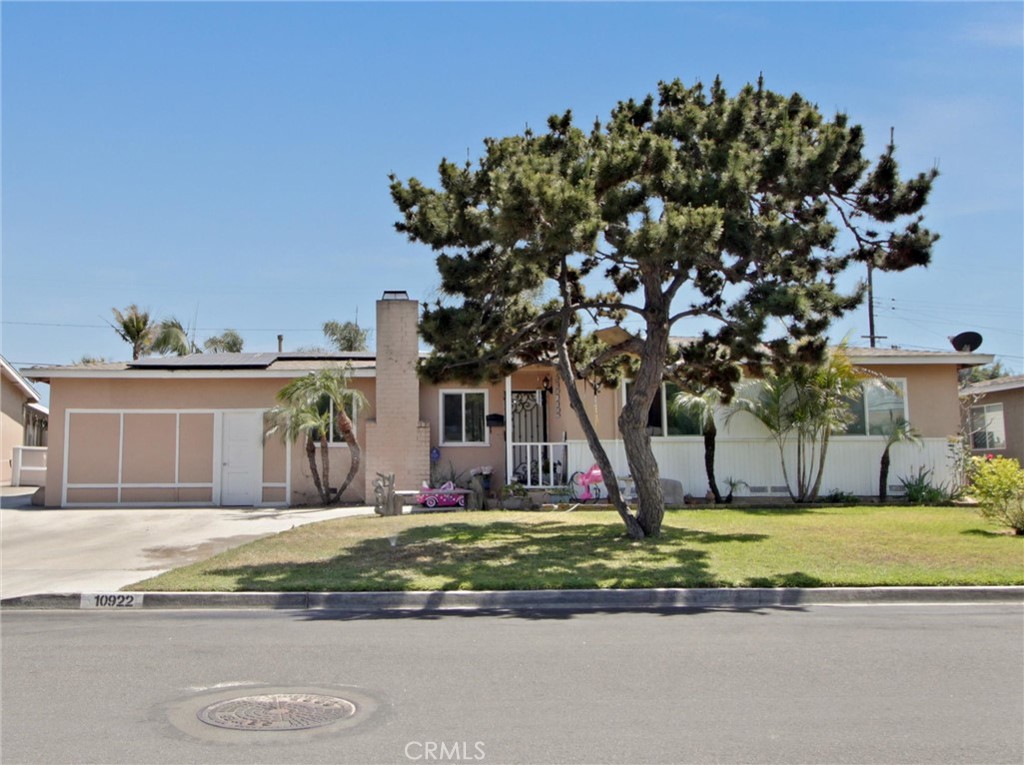 10922 Vickers Drive Garden Grove, CA 92840 - Photo 4 of 25 a view of a house with a yard