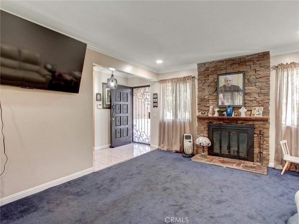 10922 Vickers Drive Garden Grove, CA 92840 - Photo 8 of 25 a view of a livingroom with furniture and a window