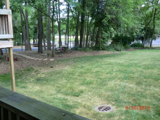 5880 Forest View Road, Unit B Lisle, IL 60532 - Photo 13 of 15 a backyard of a house with lots of green space