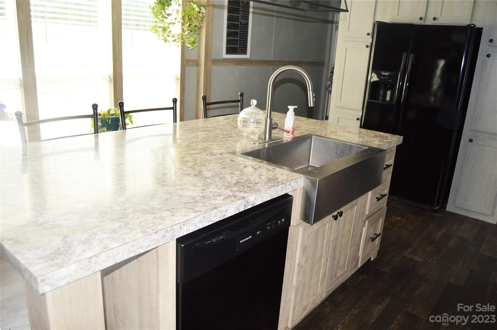 6418 Dysartsville Road Morganton, NC 28655 - Photo 11 of 20 a kitchen with sink refrigerator and stove