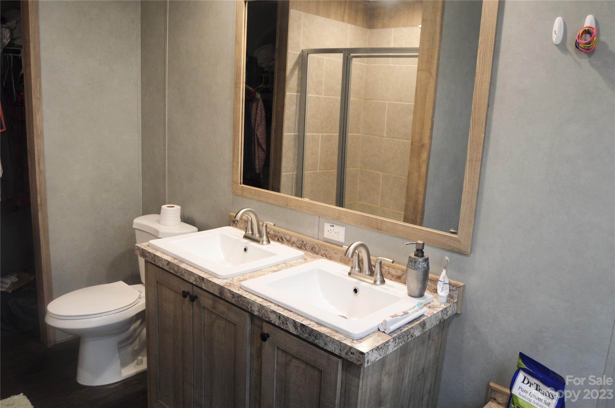 6418 Dysartsville Road Morganton, NC 28655 - Photo 15 of 20 a bathroom with a sink toilet and a mirror