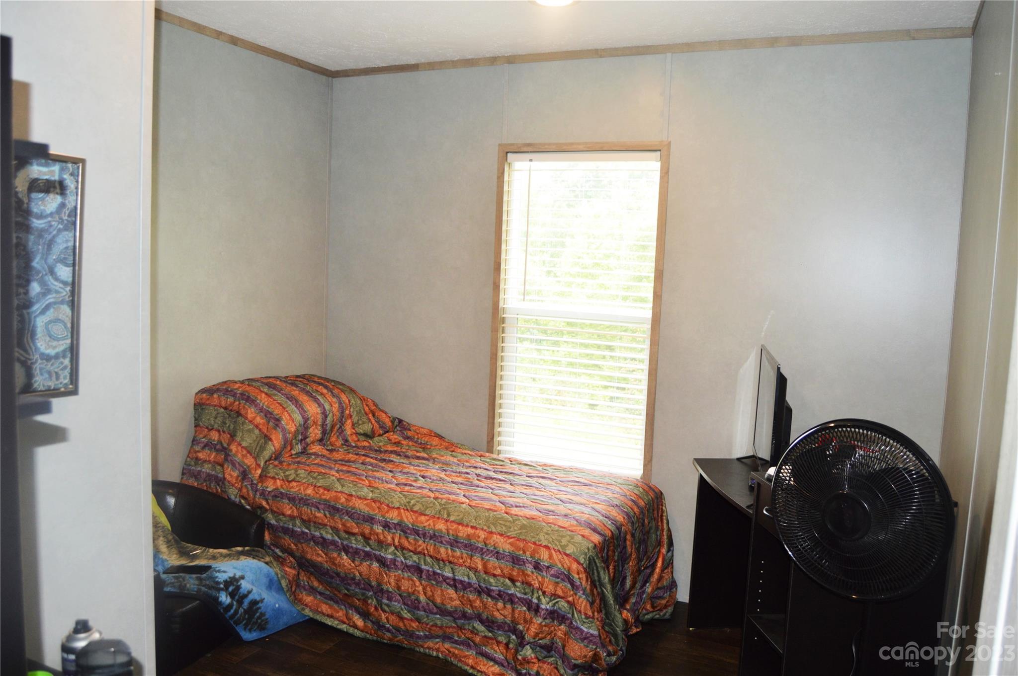 6418 Dysartsville Road Morganton, NC 28655 - Photo 18 of 20 a bedroom with a bed and a window