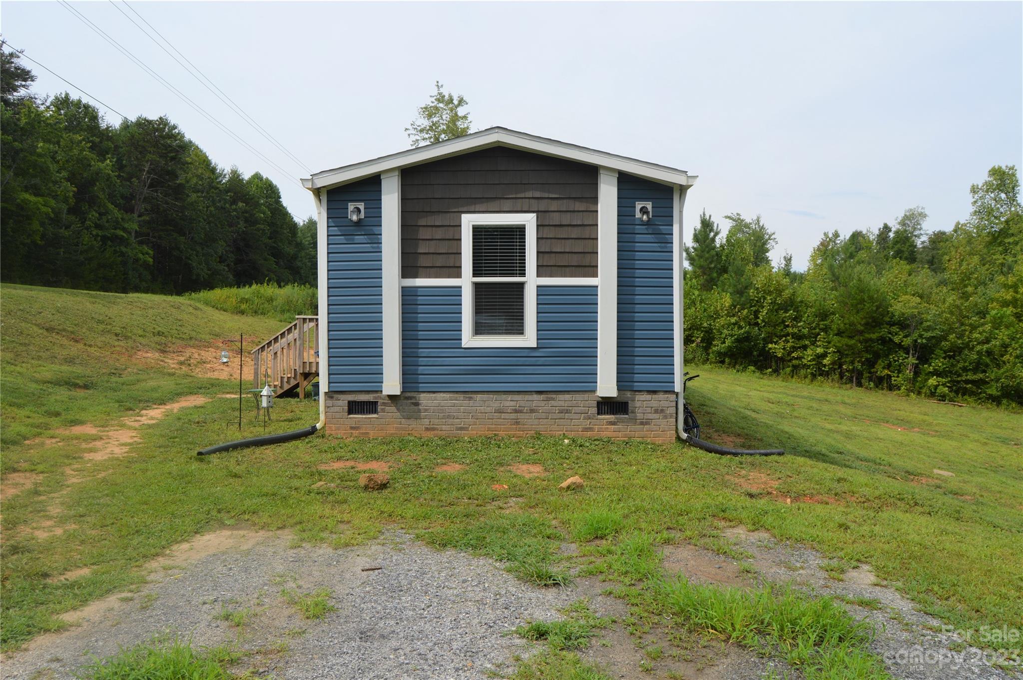 6418 Dysartsville Road Morganton, NC 28655 - Photo 2 of 20 a view of a backyard of the house