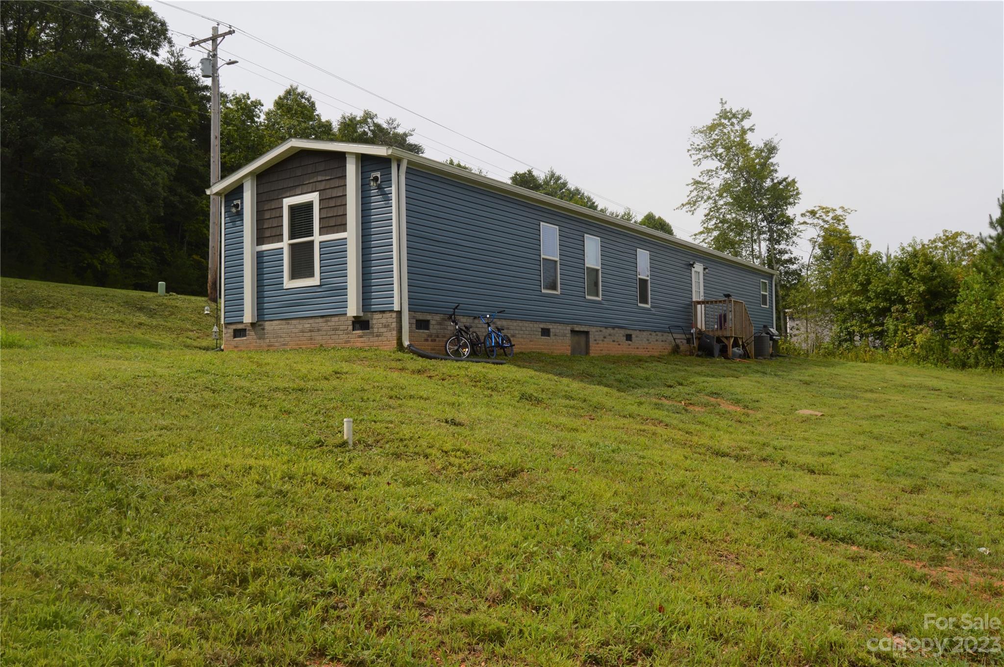 6418 Dysartsville Road Morganton, NC 28655 - Photo 5 of 20 a view of a house with a yard