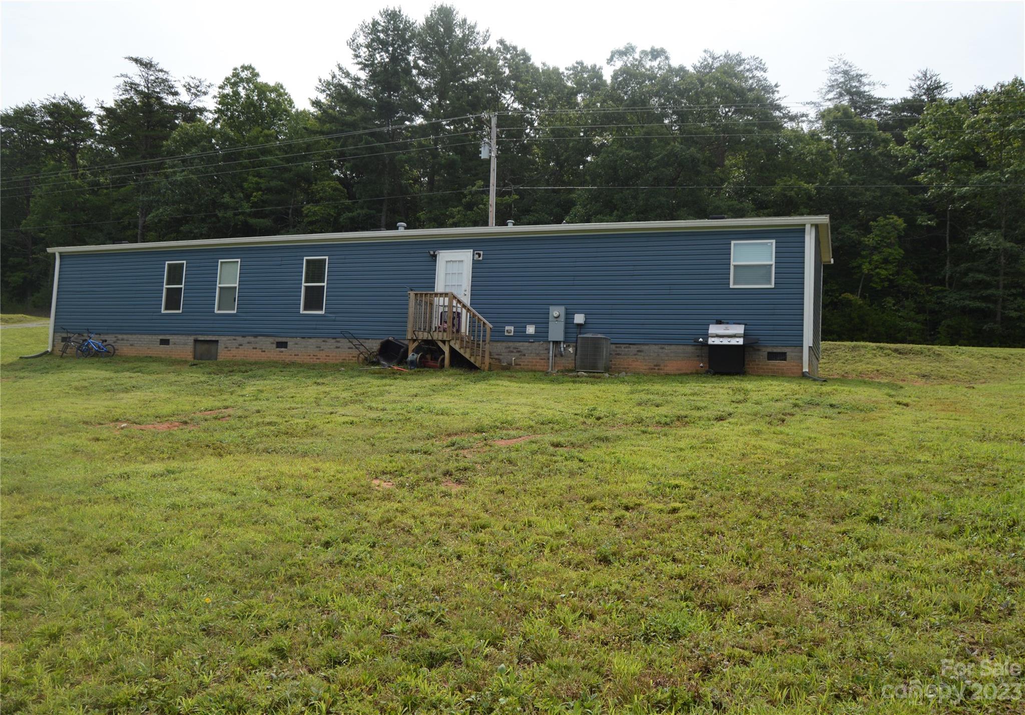 6418 Dysartsville Road Morganton, NC 28655 - Photo 6 of 20 a view of a house with a yard