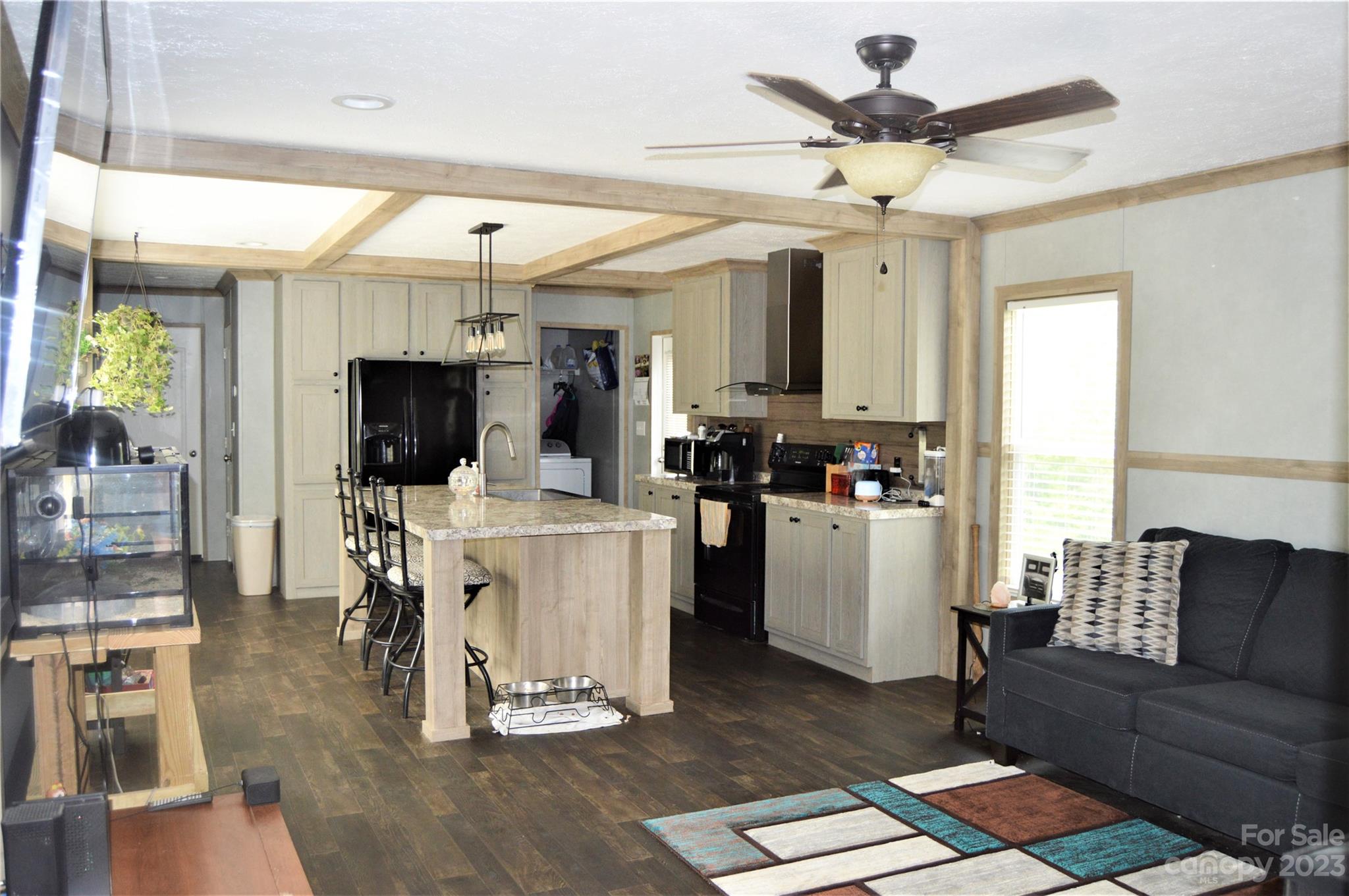 6418 Dysartsville Road Morganton, NC 28655 - Photo 9 of 20 a living room with furniture and a flat screen tv
