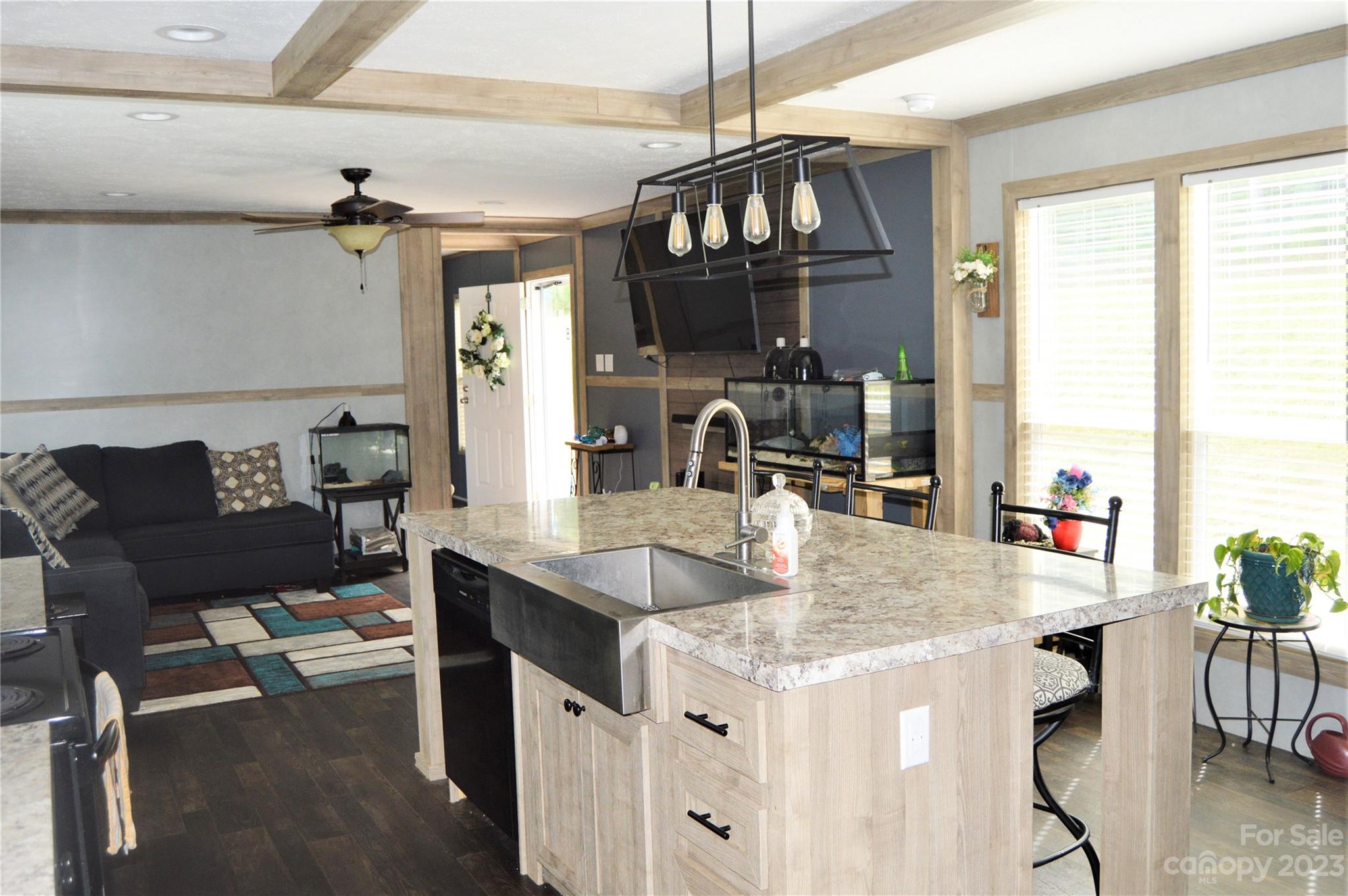 6418 Dysartsville Road Morganton, NC 28655 - Photo 10 of 20 a kitchen with a table chairs stove and cabinets