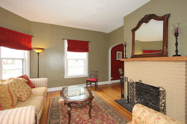 311 South Ridgeland Avenue Oak Park, IL 60302 - Photo 4 of 25 a living room with furniture a rug and a large window