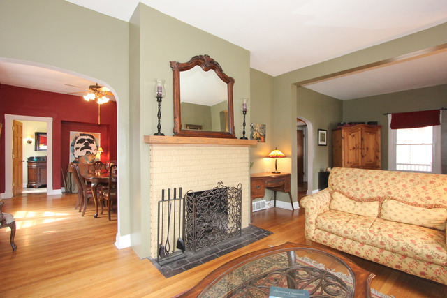 311 South Ridgeland Avenue Oak Park, IL 60302 - Photo 7 of 25 a bedroom with furniture and a fireplace