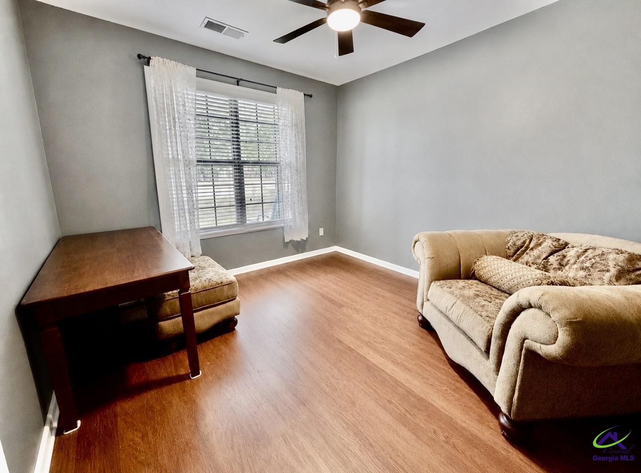 600 Post Oak Way Warner Robins, GA 31088 - Photo 10 of 50 a living room with furniture and a window