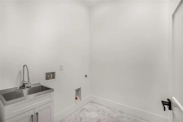 a bathroom with a sink and vanity