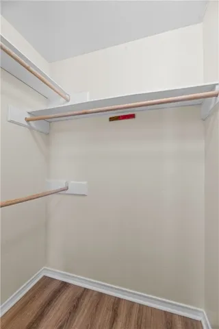 a view of a room with racks on the wall