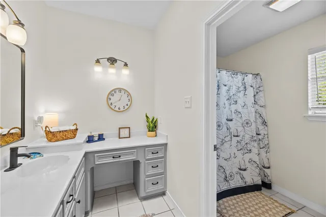 a room with a cabinet and a table