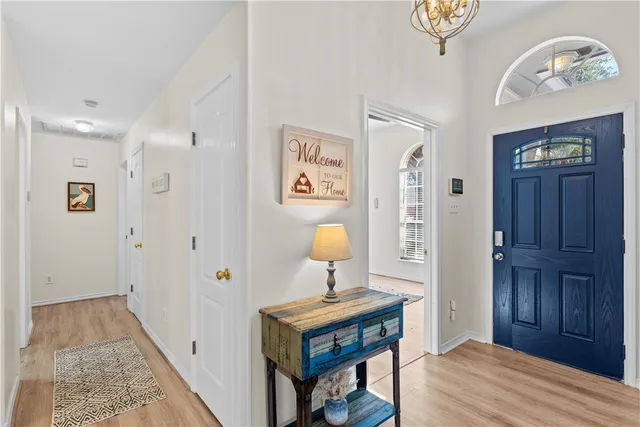 a view of room with wooden floor