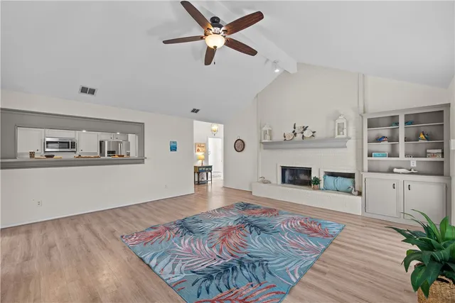 a room with a bed and a fireplace