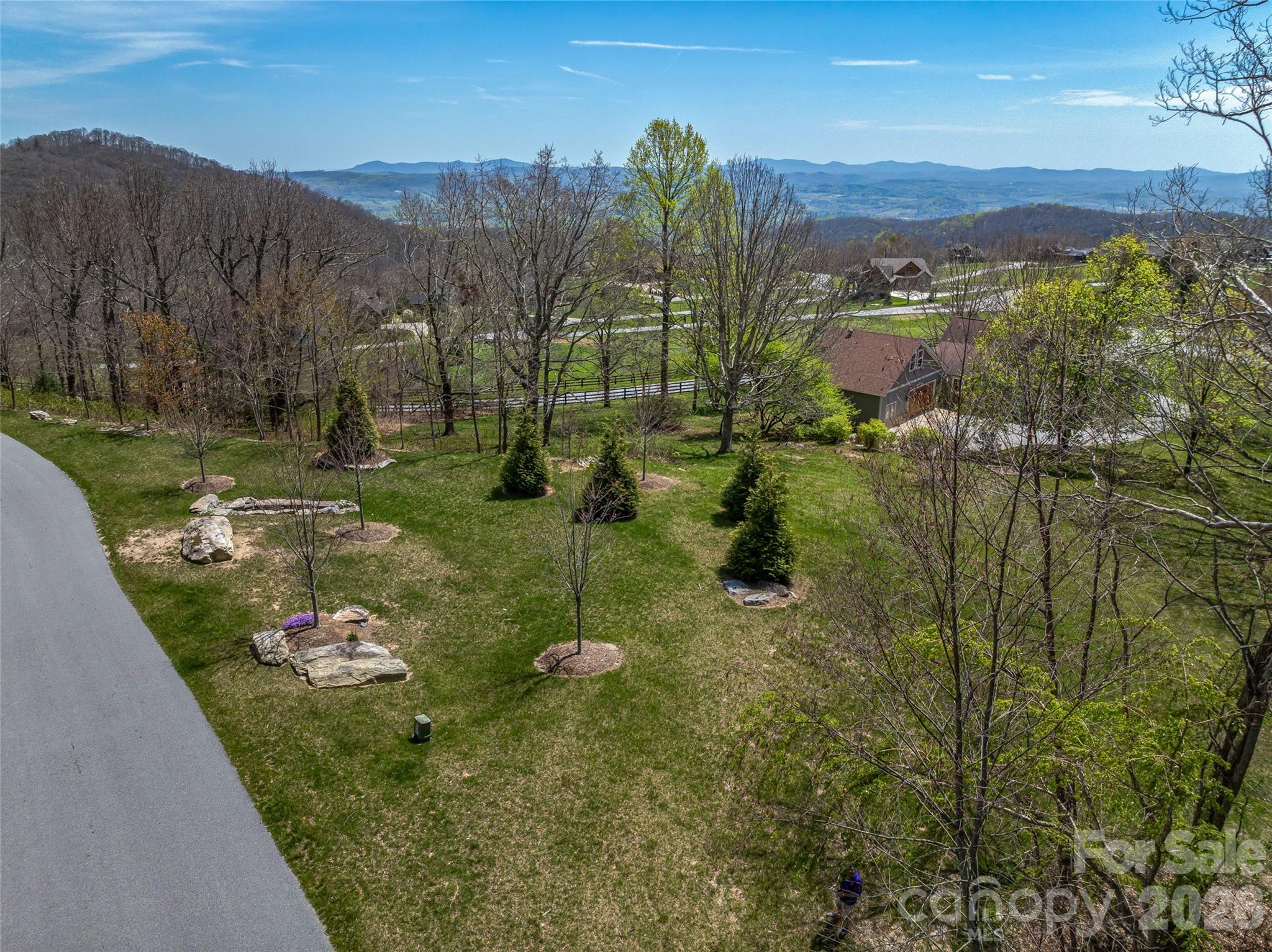 88 Autumn Ridge Lane, Unit 66 Hendersonville, NC 28792 - Photo 12 of 27 a view of a garden with an outdoor space