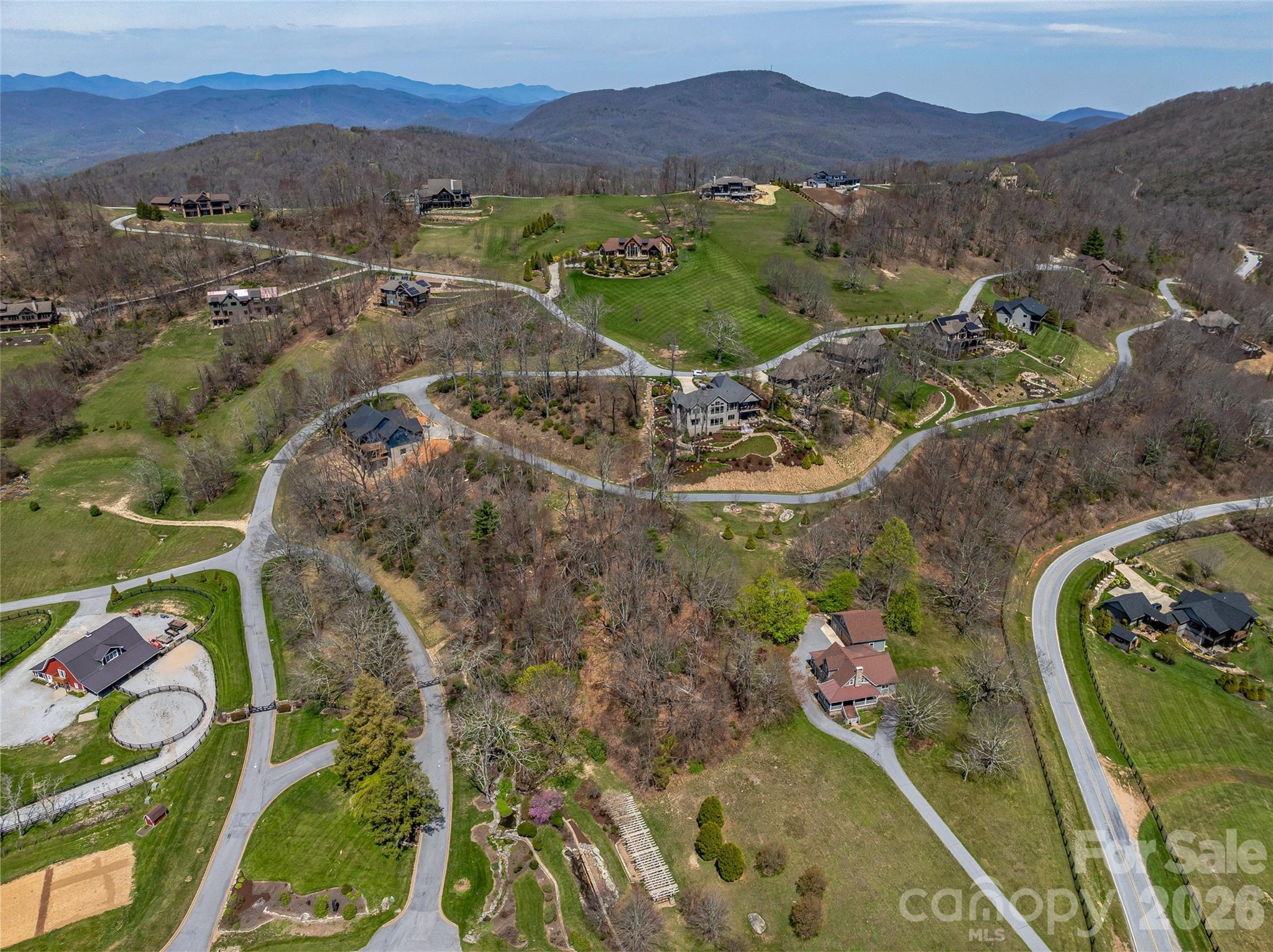 88 Autumn Ridge Lane, Unit 66 Hendersonville, NC 28792 - Photo 15 of 27 an aerial view of a house with a mountain