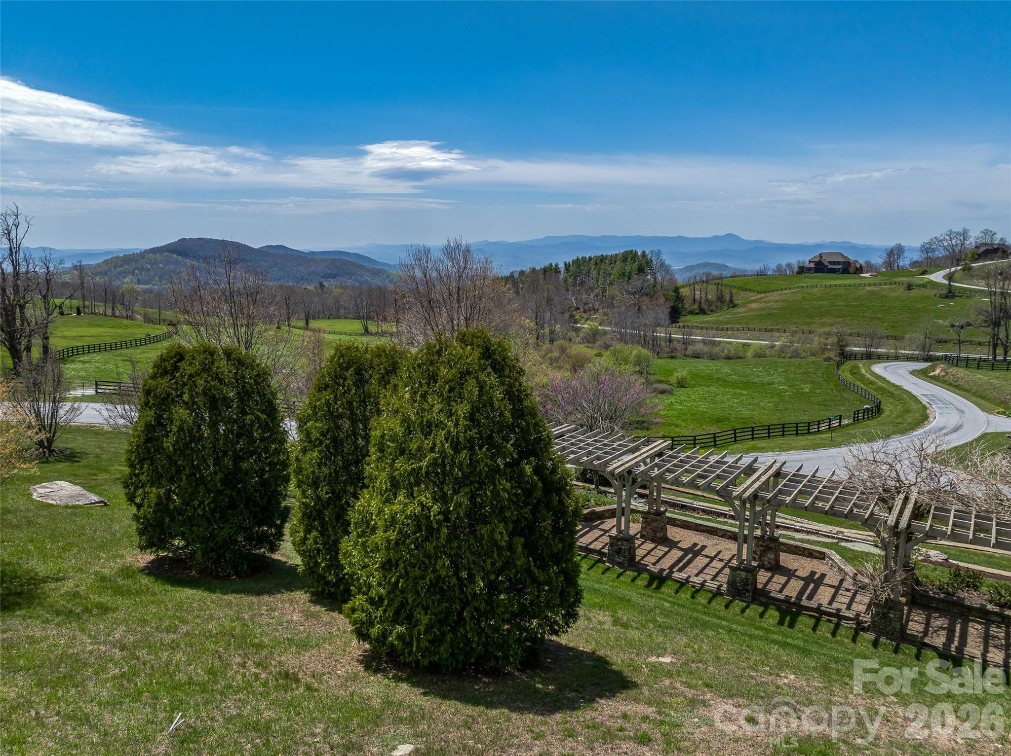 88 Autumn Ridge Lane, Unit 66 Hendersonville, NC 28792 - Photo 16 of 27 a view of a garden with an outdoor space