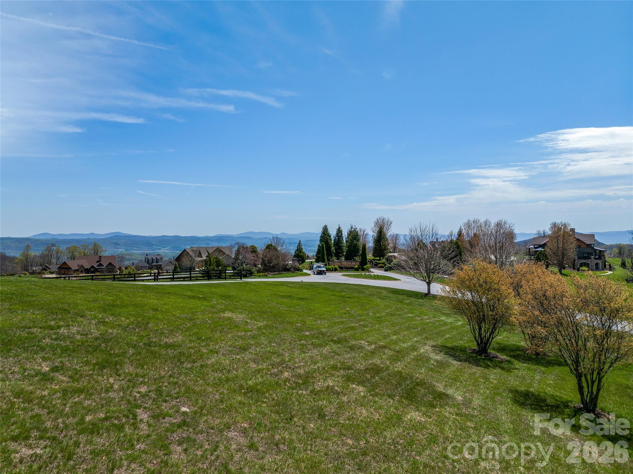 88 Autumn Ridge Lane, Unit 66 Hendersonville, NC 28792 - Photo 18 of 27 a view of a grassy area