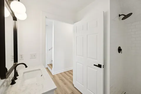 a bed room with a bed and a window