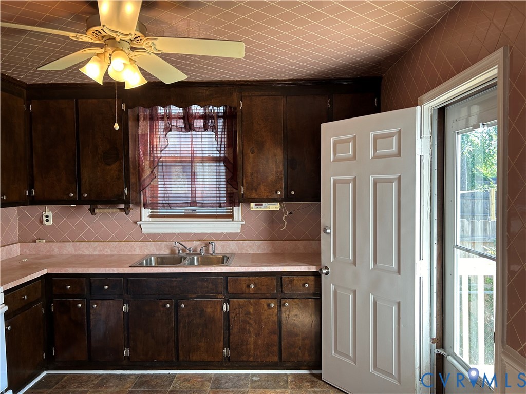 3123 Carolina Avenue Richmond, VA 23222 - Photo 11 of 23 a kitchen with a sink cabinets and a stove