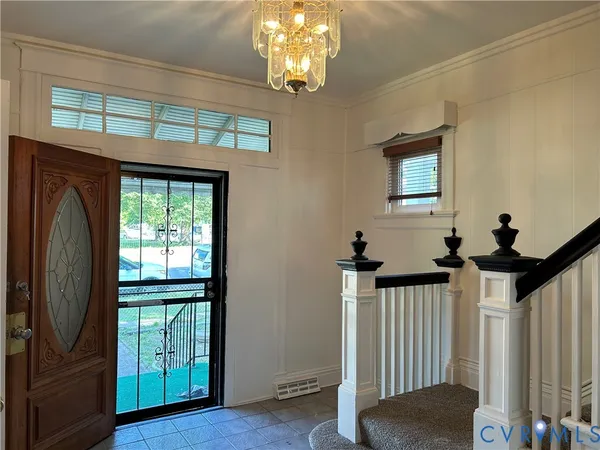a view of entryway with wooden floor