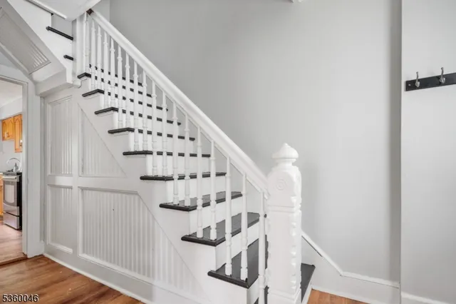 a view of entryway with wooden floor