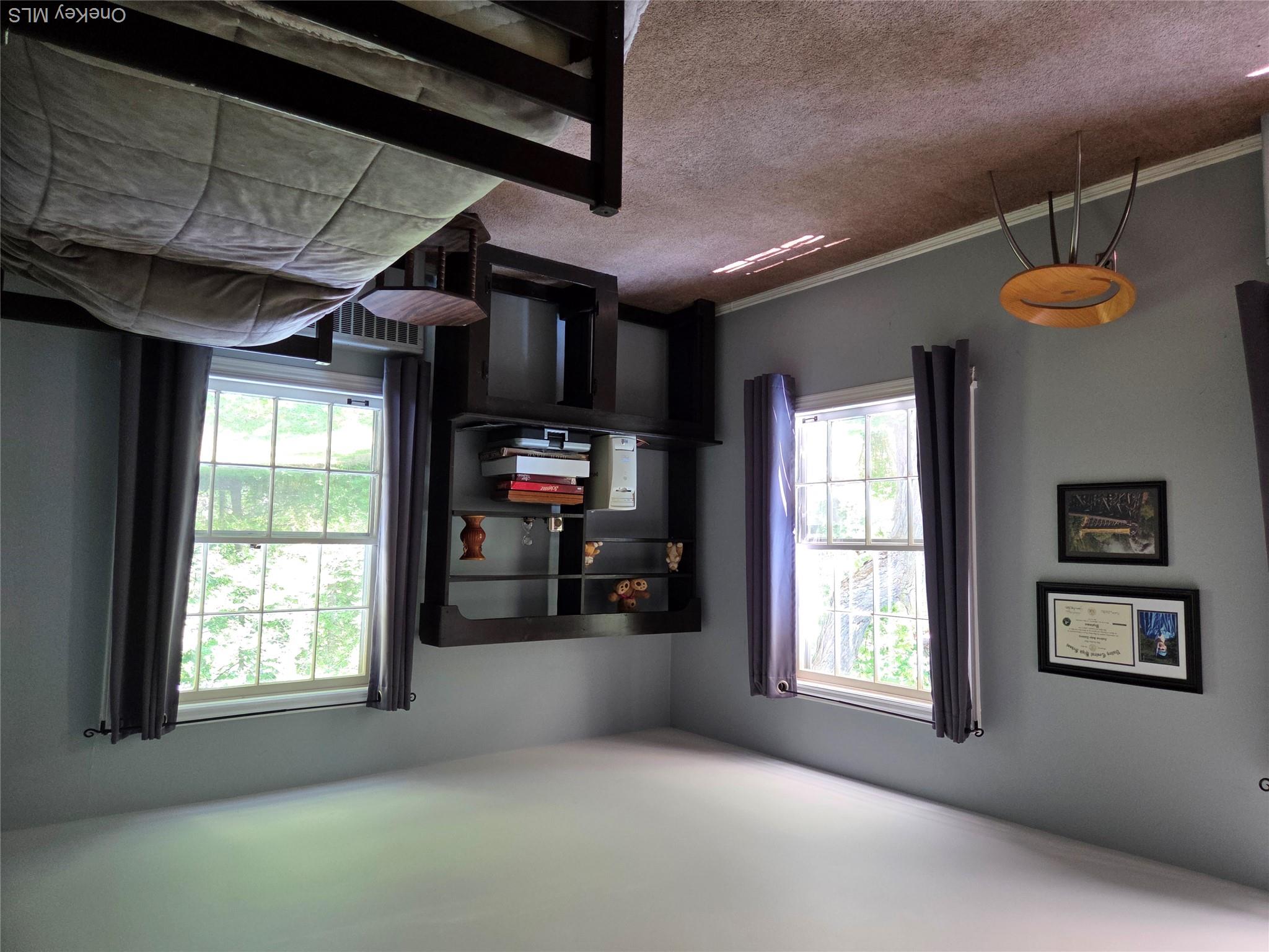 342 Coldenham Road Walden, NY 12586 - Photo 8 of 20 a living room with furniture a window and a flat screen tv