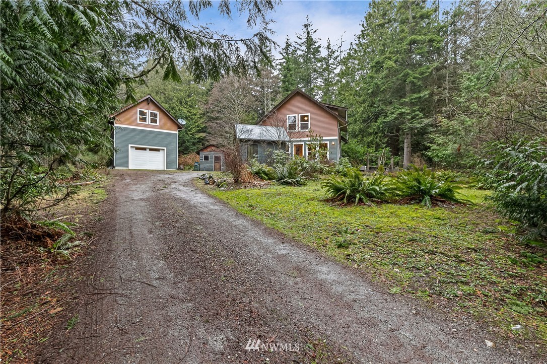 467 Cove Road Bellingham, WA 98229 - Photo 1 of 40 a front view of a house with garden