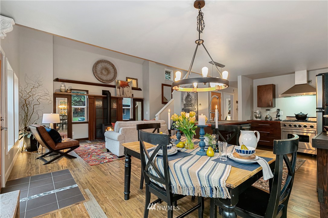 467 Cove Road Bellingham, WA 98229 - Photo 11 of 40 a view of a dining room and hall with furniture