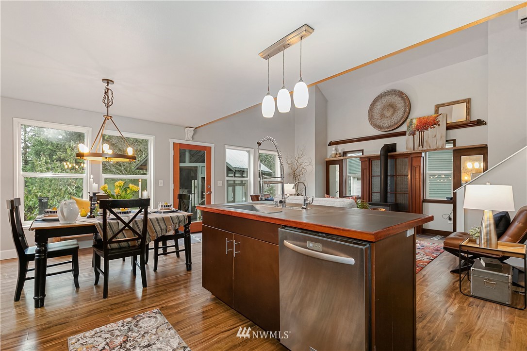 467 Cove Road Bellingham, WA 98229 - Photo 12 of 40 a very nice looking dining room with a large window and stainless steel appliances